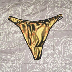 NWOT size M/6 Thong Panty Fire print Soft stretch